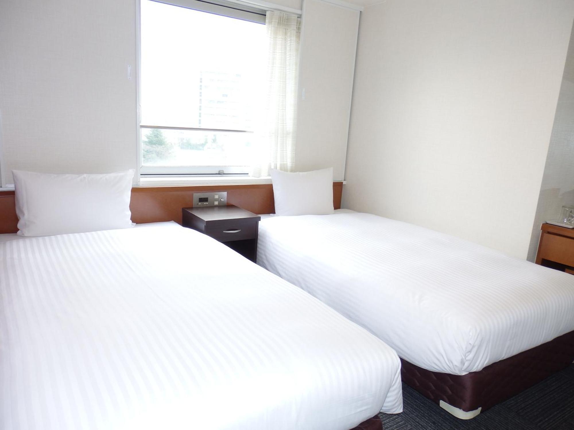 GR Hotel Ginzadori Kumamoto Værelse billede